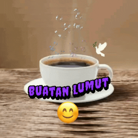 a cup of coffee on a saucer with the words buatan lumut