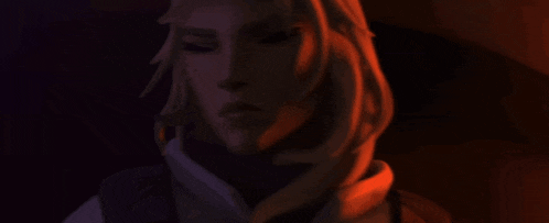 a close up of a woman 's face in the dark