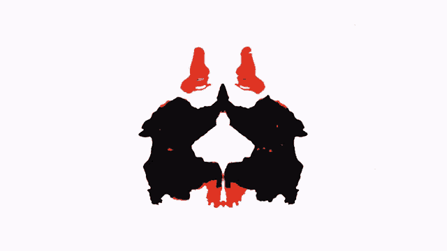 a drawing of a skull with a red and black face