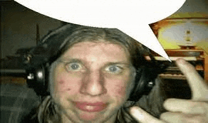 a man wearing headphones with a speech bubble over his head .