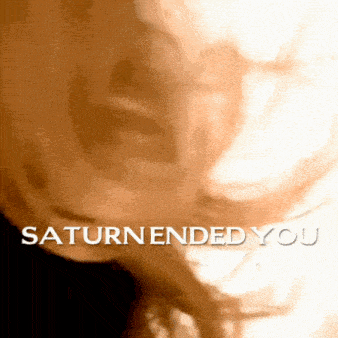 a close up of a person 's face with saturn ended you written below