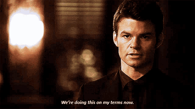 a man in a suit and tie is saying we 're doing this on my terms now