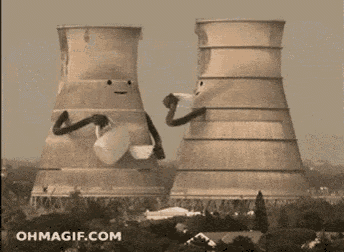 a couple of cooling towers with faces on them and arms and legs