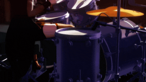 a person is playing a drum set with a cymbal that says sabian on it