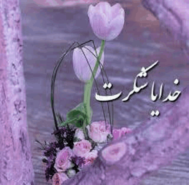 a bunch of purple flowers are sitting on top of a purple surface with a purple background .