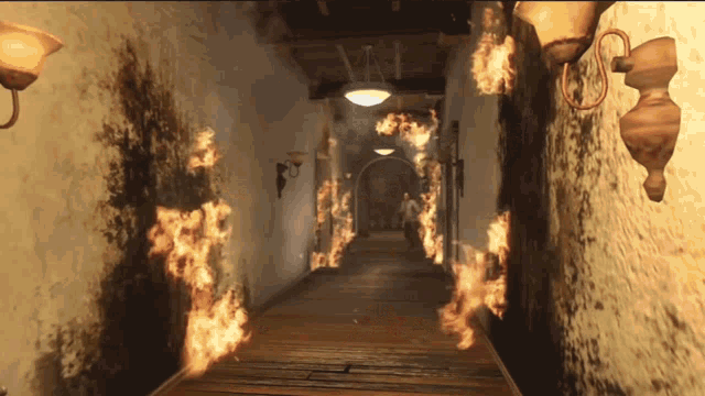 a hallway with a lot of flames coming out of the wall