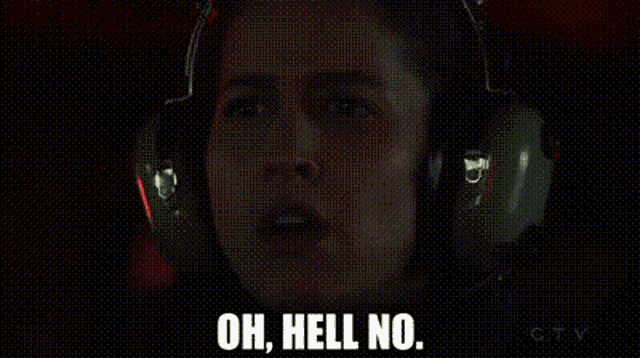 a close up of a person wearing headphones and saying `` oh , hell no '' .