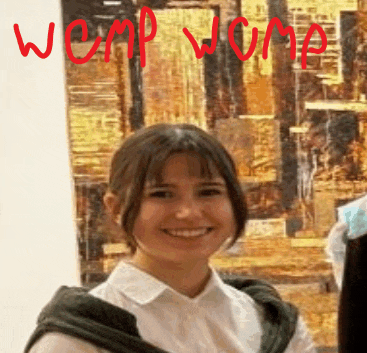 a woman is smiling in front of a painting that says wemp wimp