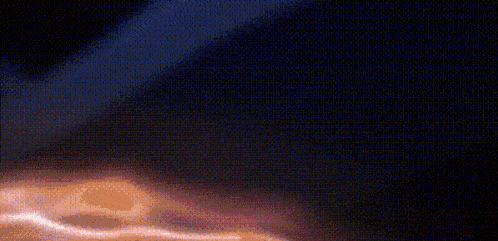 a pixelated image of a swirl of light
