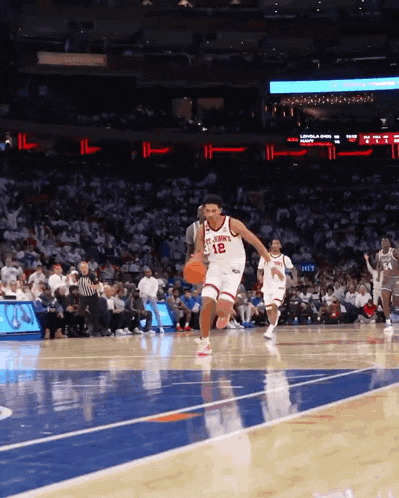 a basketball player with the number 12 on his shirt