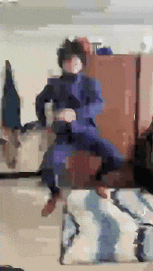 a person in a purple suit is jumping in the air