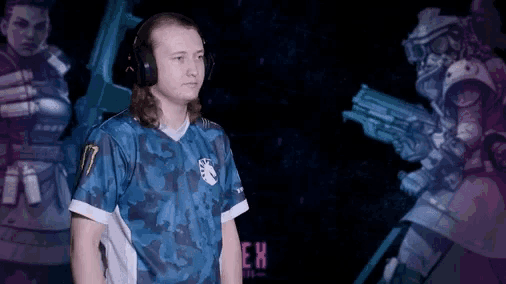 a man wearing headphones stands in front of a purple background that says ' eh ' on it