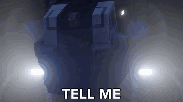 a sign that says tell me in front of a dark room