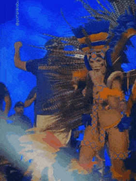 a woman in a colorful costume with the word cocoa on the bottom right