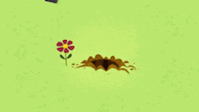 a cartoon bear is digging a hole in the ground with a remote control