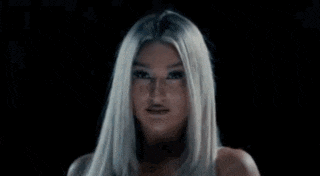 a woman with long blonde hair and the name izzi dame on the bottom