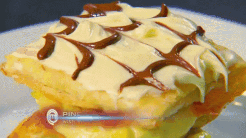 a close up of a piece of cake on a plate that says pine on the bottom