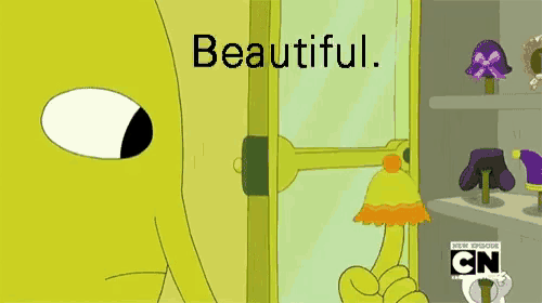 a cartoon character is standing in front of a mirror with the words beautiful written on it