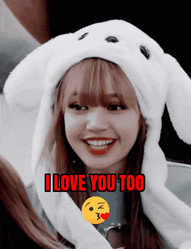 a girl wearing a bunny hat with the words i love you too above her