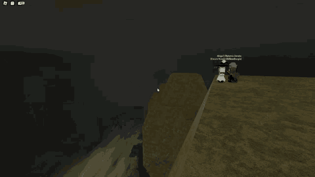 a screenshot of a video game shows a cliff and a few trees