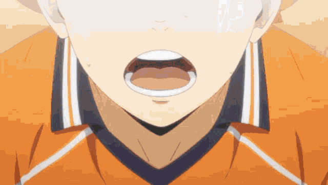 a close up of a person with their mouth open