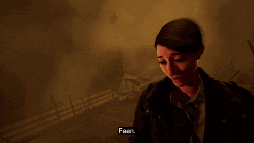 a woman in a dark room says faen