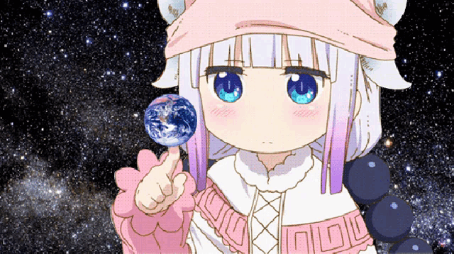 a girl with blue eyes is holding a lollipop in her hand