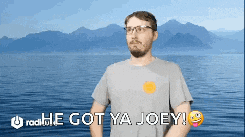 a man standing in front of a body of water says he got ya joey !