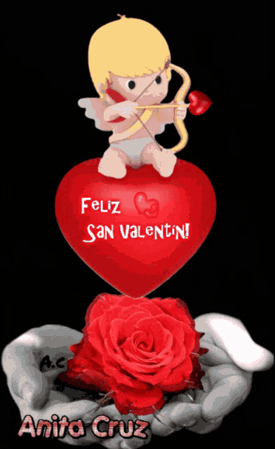 anita cruz holds a red rose and a red heart
