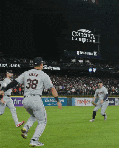 a baseball player with the number 38 on their back