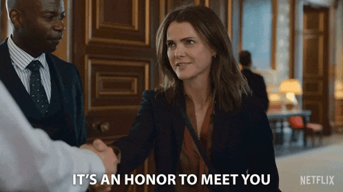 a netflix ad shows a woman shaking hands with a man and says it 's an honor to meet you