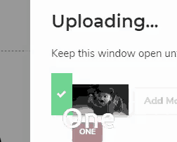 a screenshot of a website that says ' uploading ... keep this window open un '