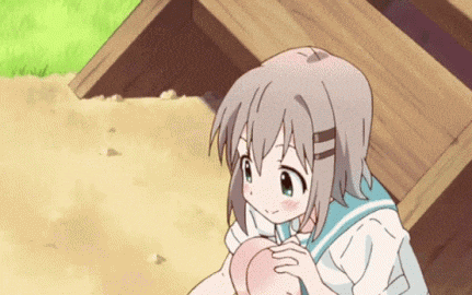 a girl in a school uniform is holding a pink object in her hands .
