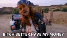 a man with a bandana on his head is standing next to a car and says bitch better have my money