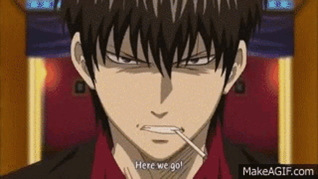 a man with a cigarette in his mouth says here we go .