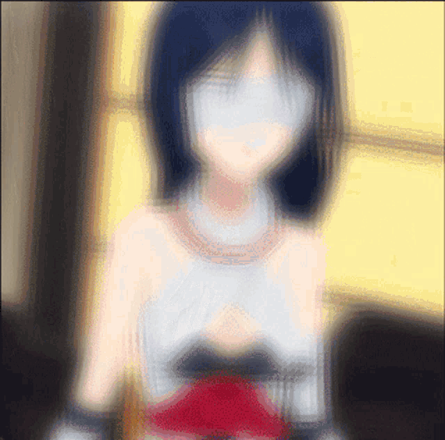 a blurry picture of a girl with a red dress on