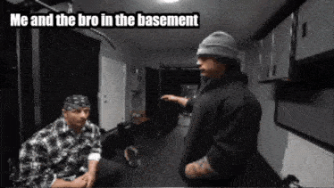 two men are talking in a basement with the caption " me and the bro in the basement "