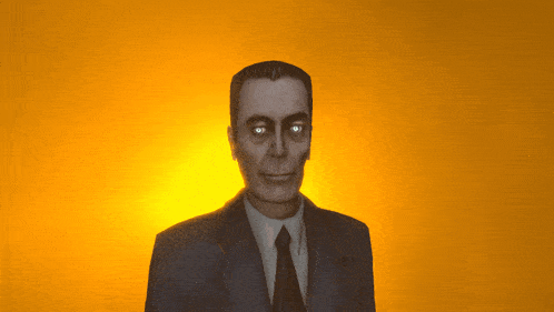 a man in a suit and tie with glowing eyes is smiling