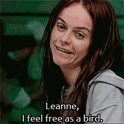 a woman with long hair is smiling and says leanne i feel free as a bird