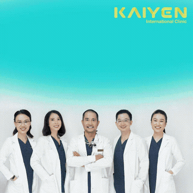 a group of doctors standing in front of a kaiyen international clinic