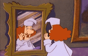 a cartoon character is looking at his reflection in a picture frame