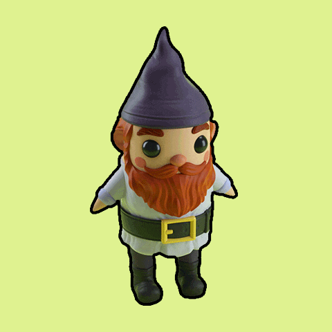 a figurine of a gnome with a beard and hat
