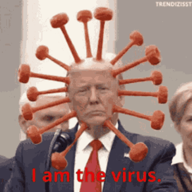 a man in a suit and tie has a virus on his head and says i am the virus