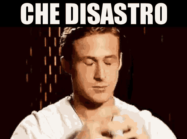 a man is praying with his eyes closed in front of a sign that says che disastro