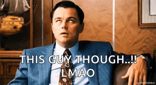 a man in a suit and tie is sitting on a couch and saying " this guy though lmao "