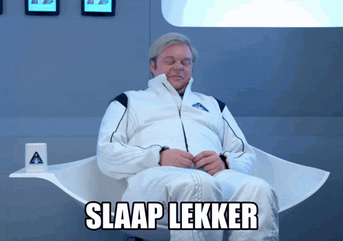 a man is sitting in a chair with the words slaap lekker written above him