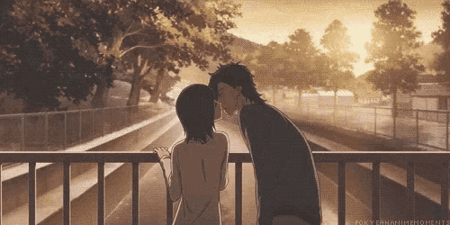 a man and a woman kissing on a railing with the hashtag #kyerhanimemoments below them