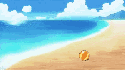 a beach scene with a beach ball on the sand