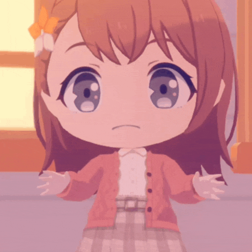 a little girl with a flower in her hair is wearing a pink cardigan and plaid skirt