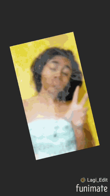 a girl is giving a peace sign in a photo that was taken with funimate
